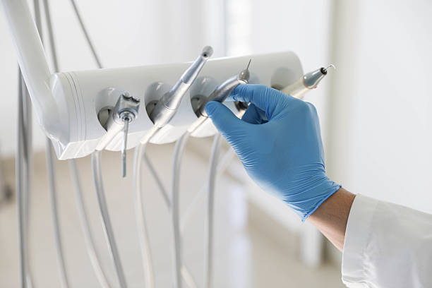 Professional Tooth Extraction technician working in Brightwaters, NY